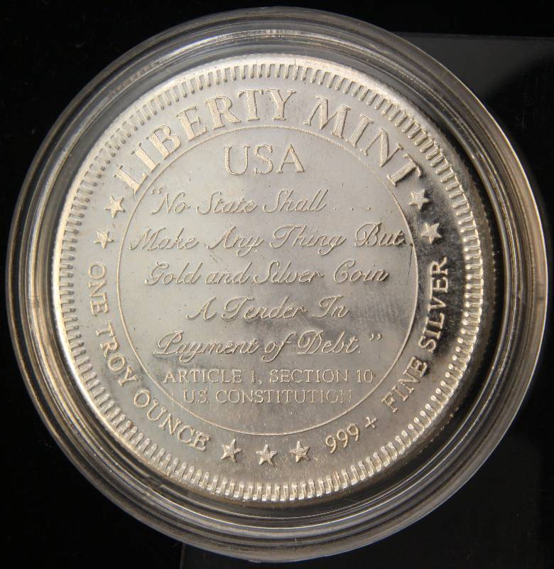 lot 86 image: 1 TROY OZ. .999 FINE SILVER LIBERTY MINT NO STATE SHALL... IN AIRTITE