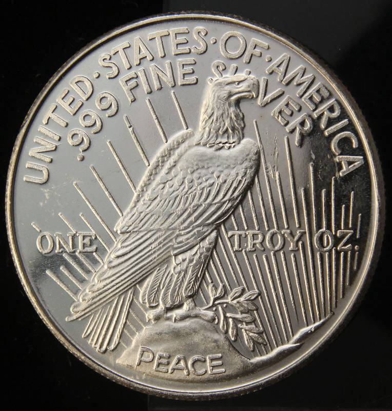 lot 91 image: 1 TROY OZ. .999 FINE SILVER PEACE DOLLAR DESIGN