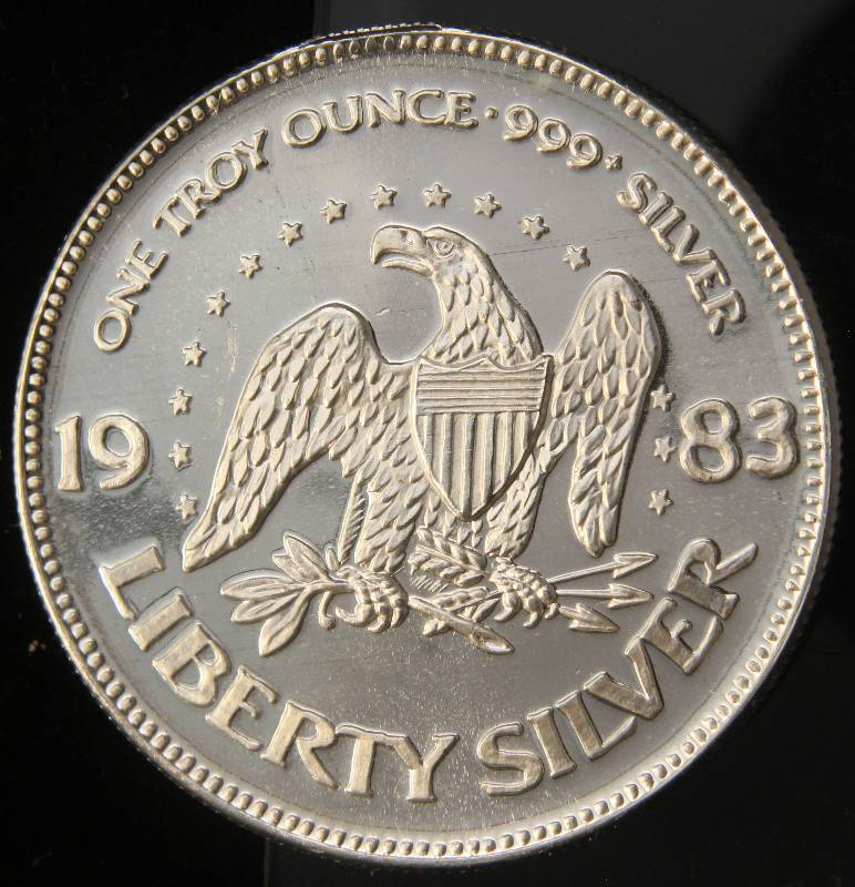 lot 95 image: 1 TROY OZ. .999 FINE SILVER 1983 A-MARK LIBERTY ROUND
