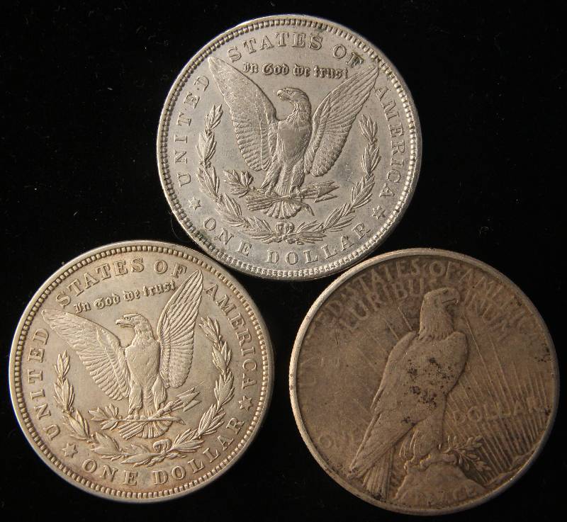 lot 99 image: 3 SILVER DOLLARS 1885, 1921, 1922-S