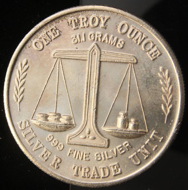 lot 100 image: 1 TROY OZ. .999 FINE SILVER TRADE UNIT EAGLE WITH FLAG