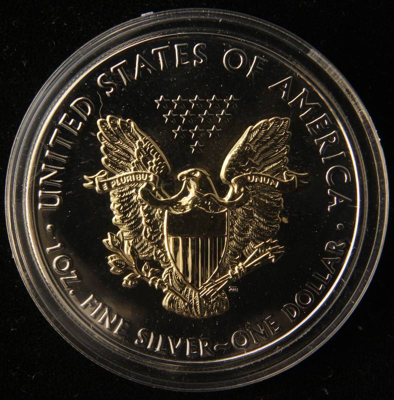 lot 106 image: 2008 AMERICAN SILVER EAGLE 1 TROY OZ. .999 FINE SILVER GOLD ENHANCED IN AIRTITE