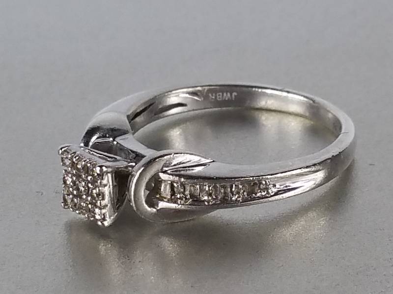 $800 Retail.  Ladies Princess Cut Diamond Ring