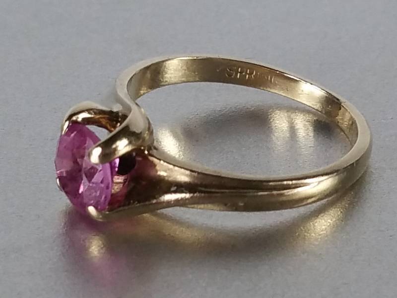 $650 Retail.  Ladies Designer Pink Sapphire Ring in 10k Yellow Gold