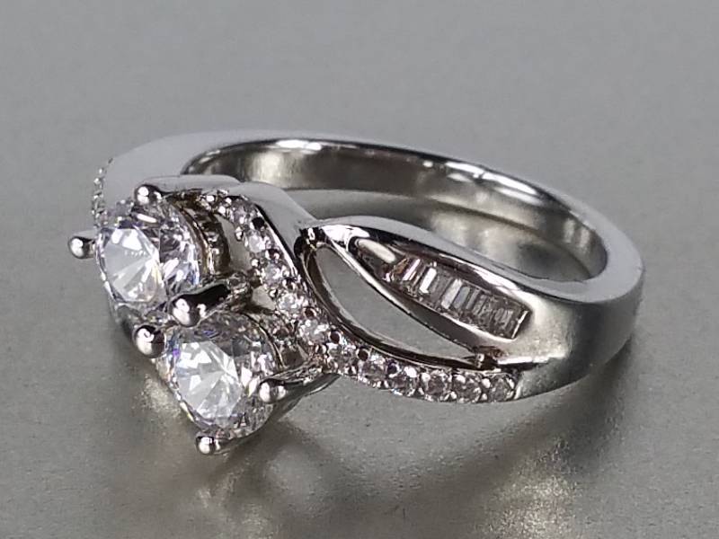 $750 Retail.  Ladies Forever White Sapphire Ring
