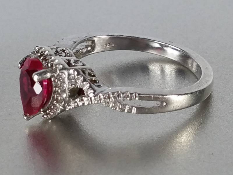$525 Retail.  Ladies Ruby and Diamond Heart Ring