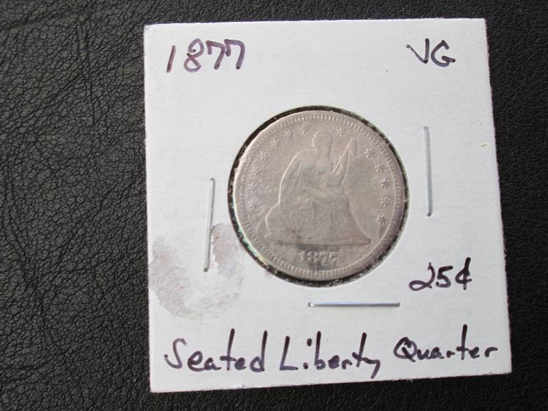1877 Quarter Dollar...