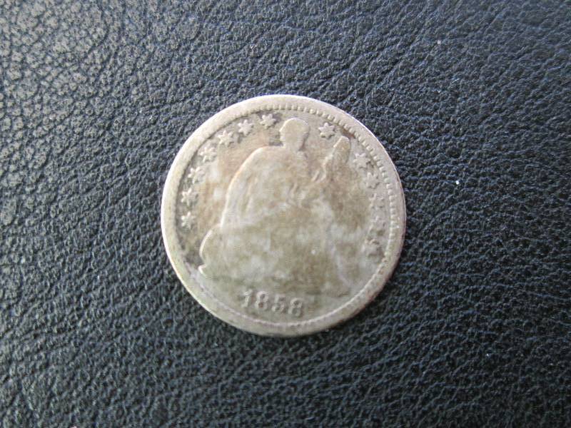 1858 O Half Dime...