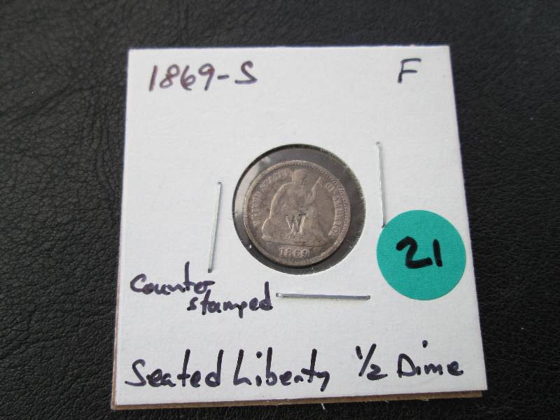 1869 S Center Stamped Half Dime...