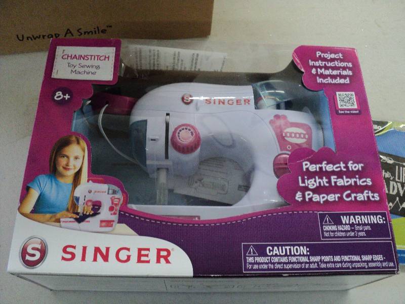 Childs singer sewing machine...