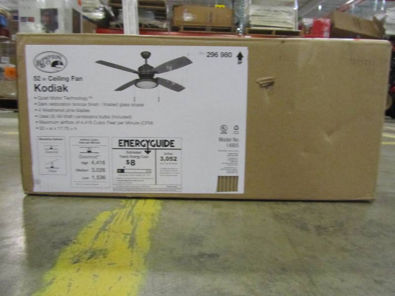lot 53 image: Hampton Bay Kodiak 52 in. IndoorOutdoor Dark Restoration Bronze Ceiling Fan with Light Kit