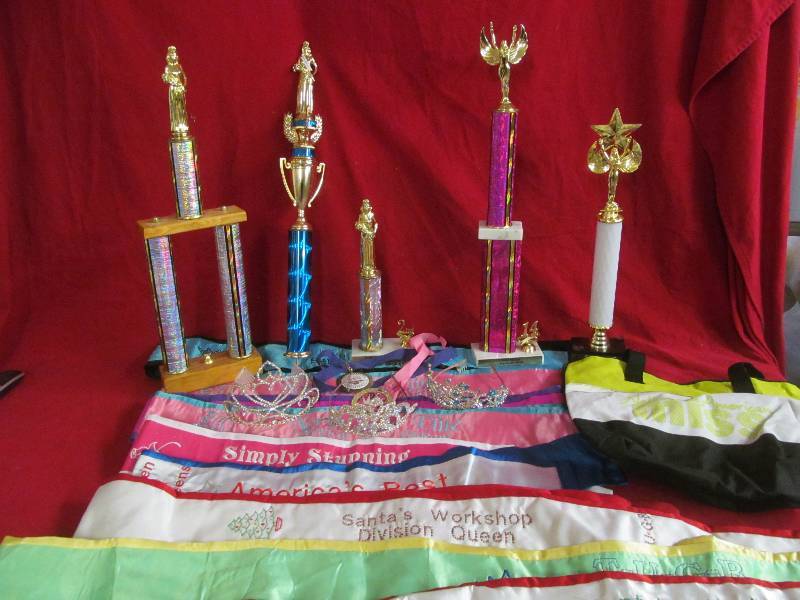 Pageant sashes, trophies, tiaras