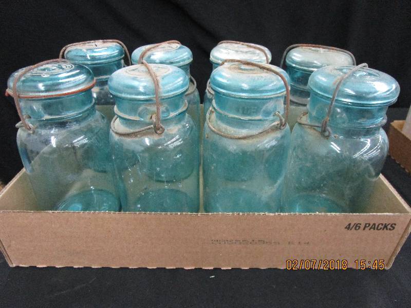 lot 8 image: Various Blue Quart Jars