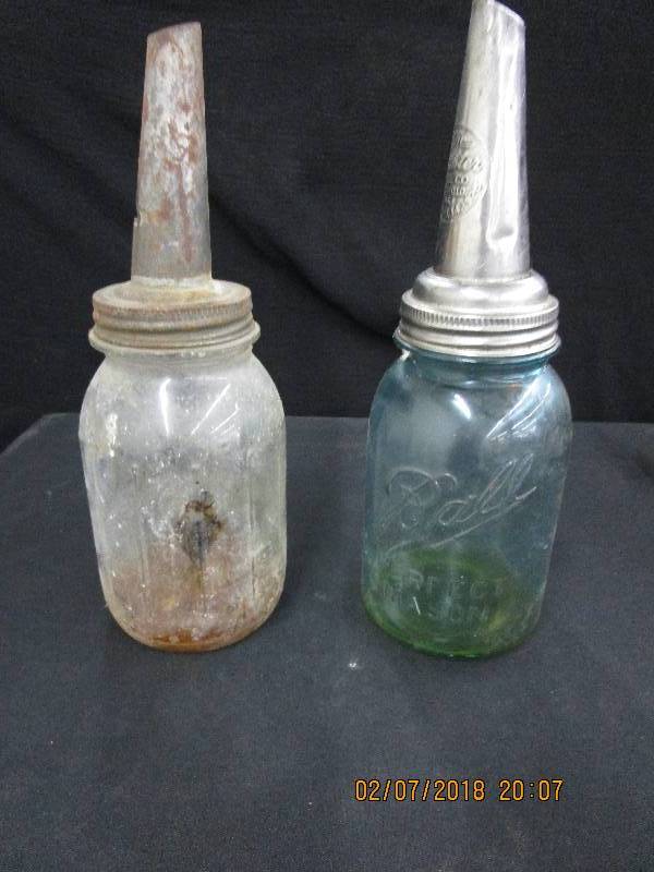 lot 43 image: 2 Oil Jars (The Master Manufacturing Co on one Spout.)