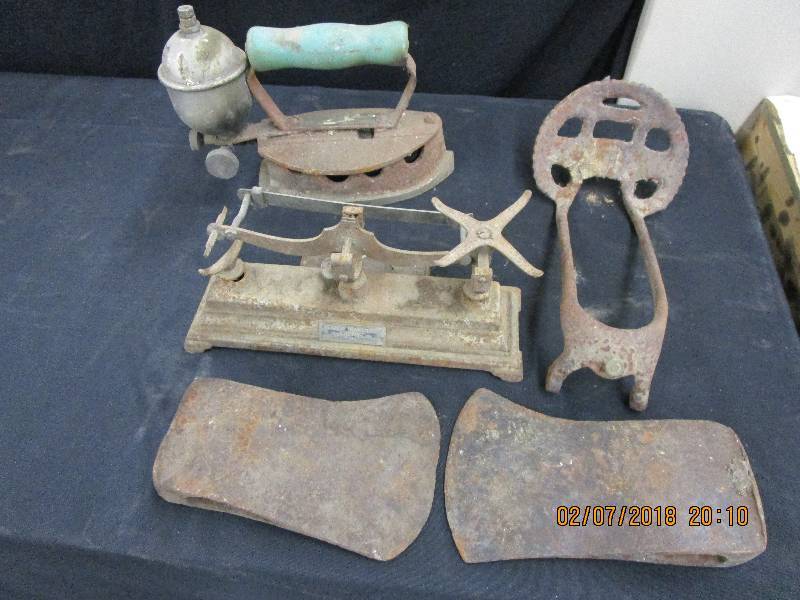 lot 46 image: 2 ax heads, Royal Model D Iron, Henry Troemner Scale Bar 4 oz #6, parts to an old Cow waterer and