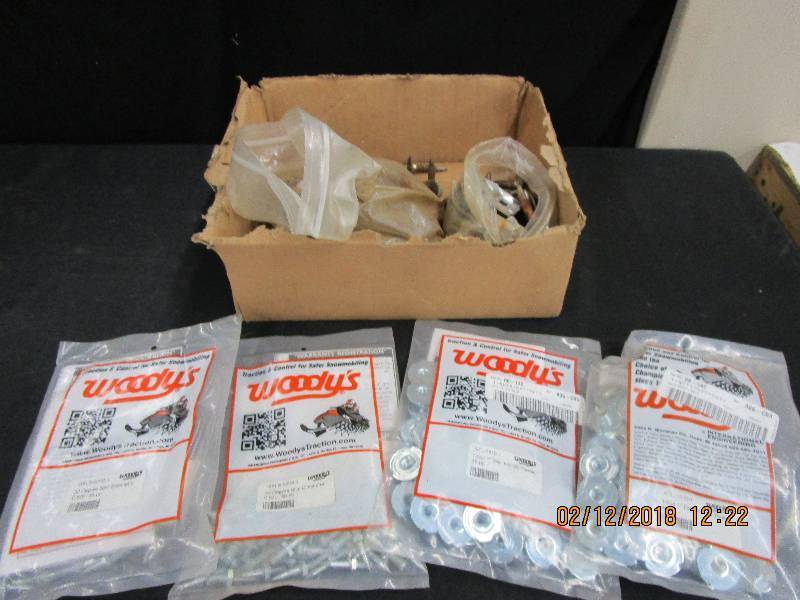 lot 131 image: Snowmobile Studs and T-Nuts for better Traction