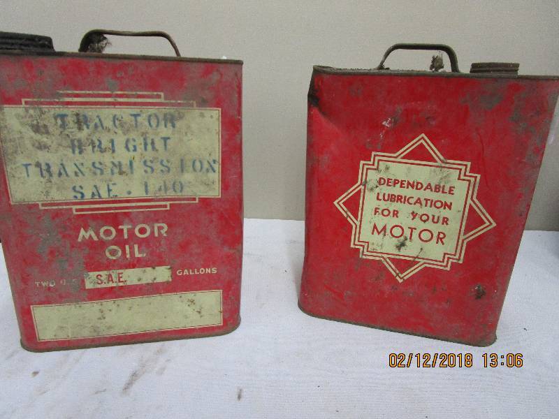 lot 135 image: 4- Motor Oil Cans