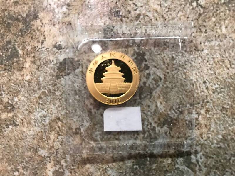 lot 24 image: 2016 Chinese Panda 3g .999 Gold BU Coin