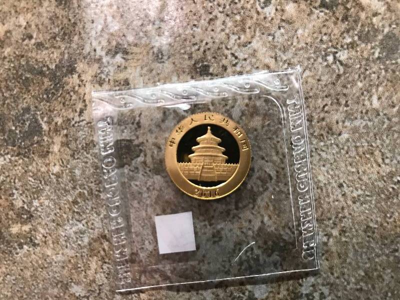 lot 26 image: 2016 Chinese Panda 3g .999 Gold BU Coin
