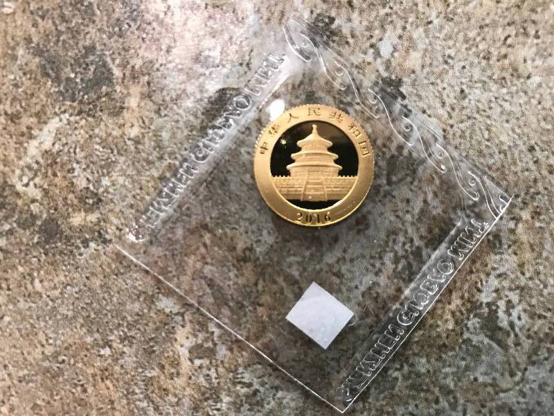 lot 28 image: 2016 Chinese Panda 3g .999 Gold BU Coin