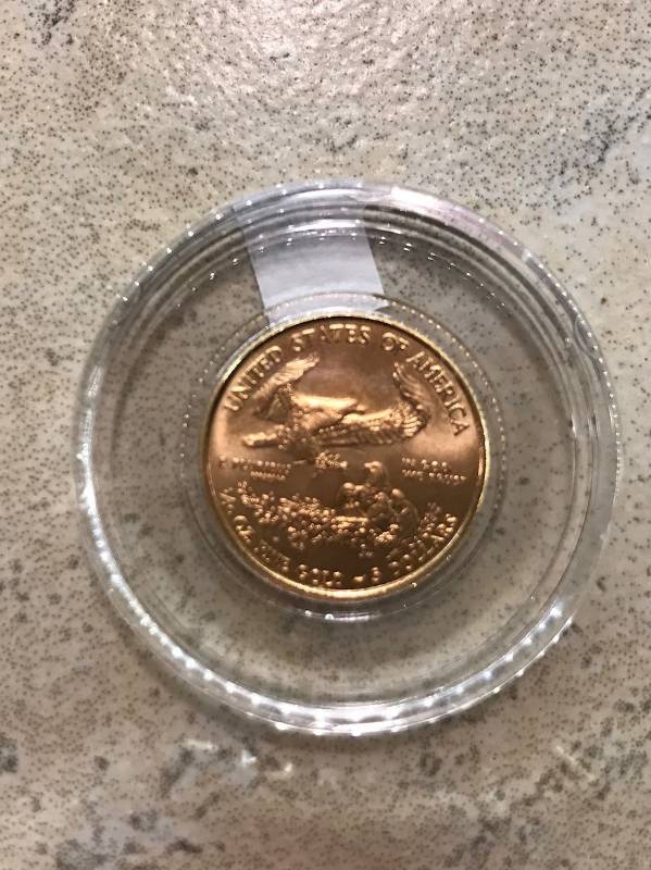 lot 35 image: 2015 - 110 Troy Oz Gold American Eagle $5 Coin