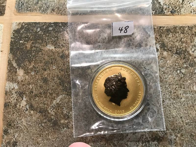 lot 48 image: 2015 12 oz Australian Gold Lunar Year of the Goat BU 24kt