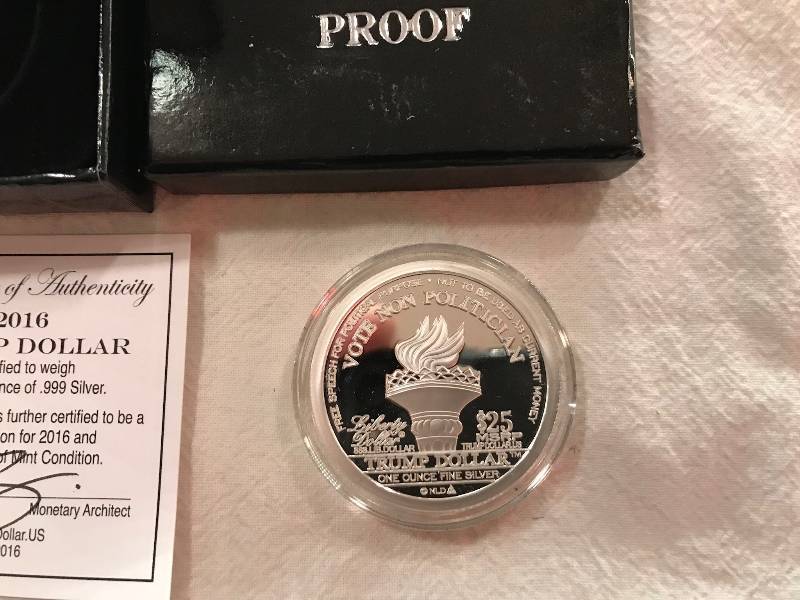 lot 94 image: 2016 Donald Trump Dollar 1oz Silver Proof - NORFED