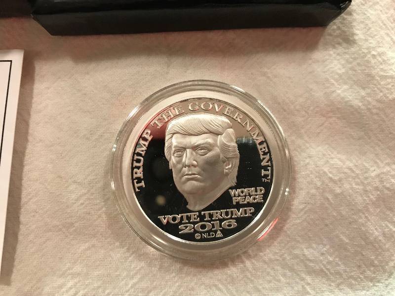 lot 96 image: 2016 Donald Trump Dollar 1oz Silver Proof - NORFED