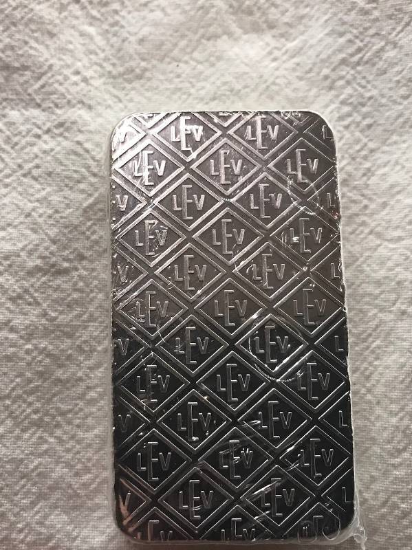 lot 98 image: GEIGER SECURITY LINE SILVER BAR 10 OZ .999