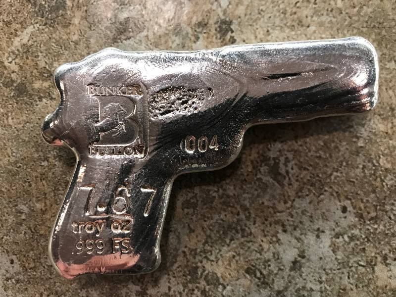 lot 214 image: Bunker Bullion Colt Pistol 7.67 oz. Poured .999 Fine Silver