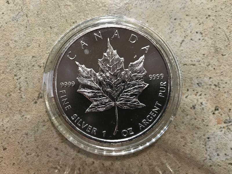 lot 219 image: 2009 1 oz. Silver Canadian Maple Leaf .9999 Fine Silver