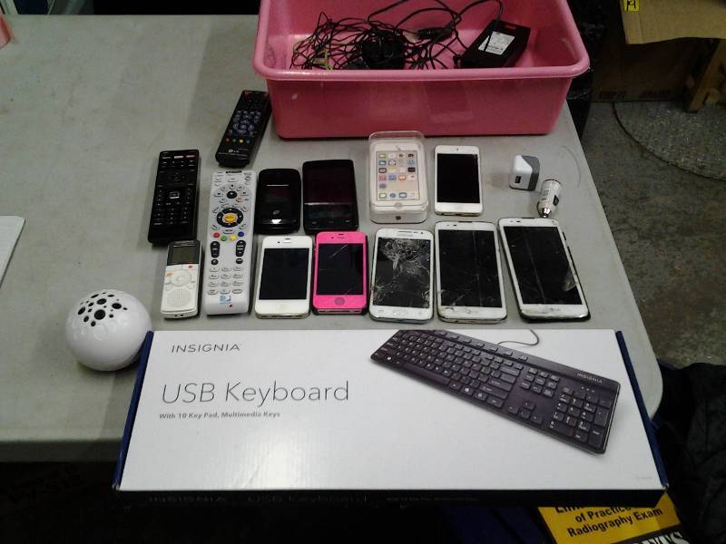 lot 6 image: Lot Of Cell Phones, TV Remotes, Keyboard, Speaker