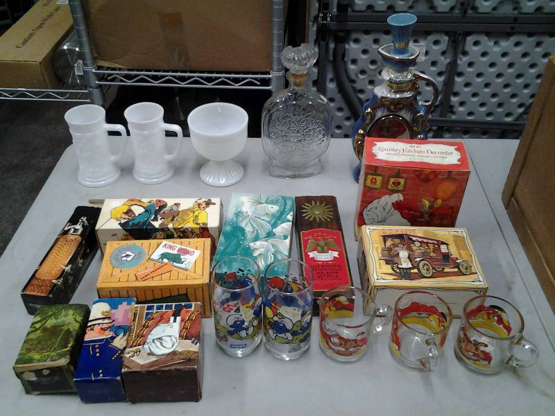 lot 37 image: Jim Beam Decanter, Avon Collectibles With Original Boxes, Cartoon Glasses