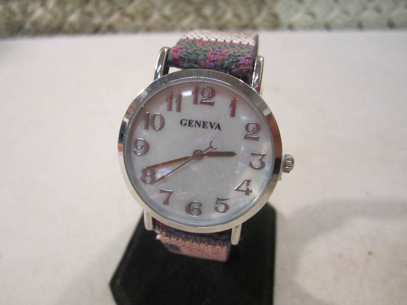 lot 14 image: Geneva Watch with Display Stand  FS...