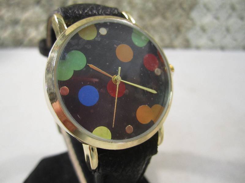 lot 17 image: Multi Color Dot Faced Watch with Di...