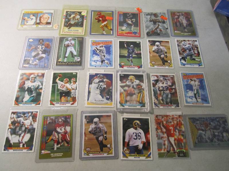 lot 93 image: Lot of 24 Football Cards in Sleeves...