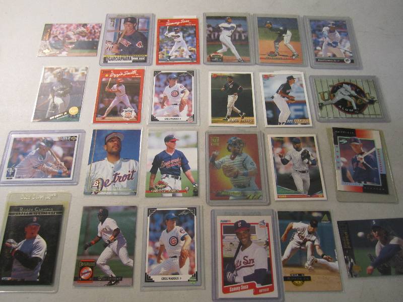 lot 98 image: Lot of 24 Baseball Cards in Sleeves...