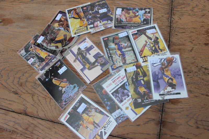 lot 32 image: 15 Kobe Bryant Cards...