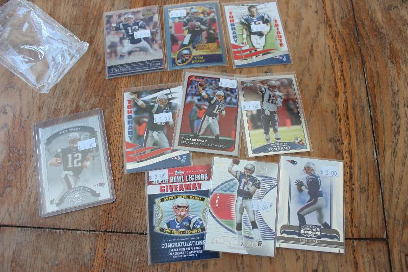 lot 41 image: Tom Brady Cards...