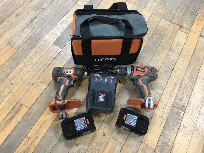 lot 14 image: Ridgid 18-Volt X4 Lithium-Ion Cordless DrillDriver and Impact Driver 2 Tool Combo Kit  open box not used
