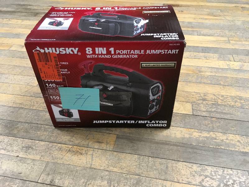 lot 71 image: Husky 8 in 1 Portable Jumpstart with Hand Generator open box not used