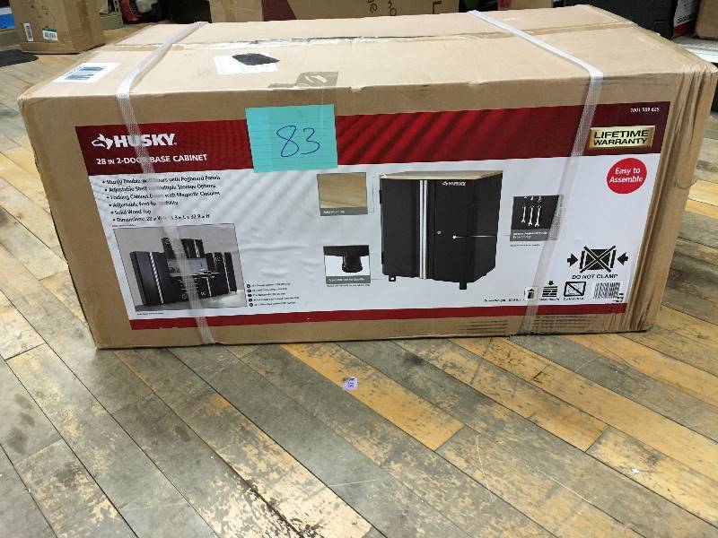 lot 83 image: Husky 28 in. 2-Door Base Cabinet open box not used