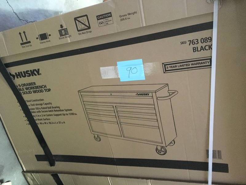 lot 90 image: Husky 46 in. 9-Drawer Mobile Workbench with Solid Wood Top, Black  not used