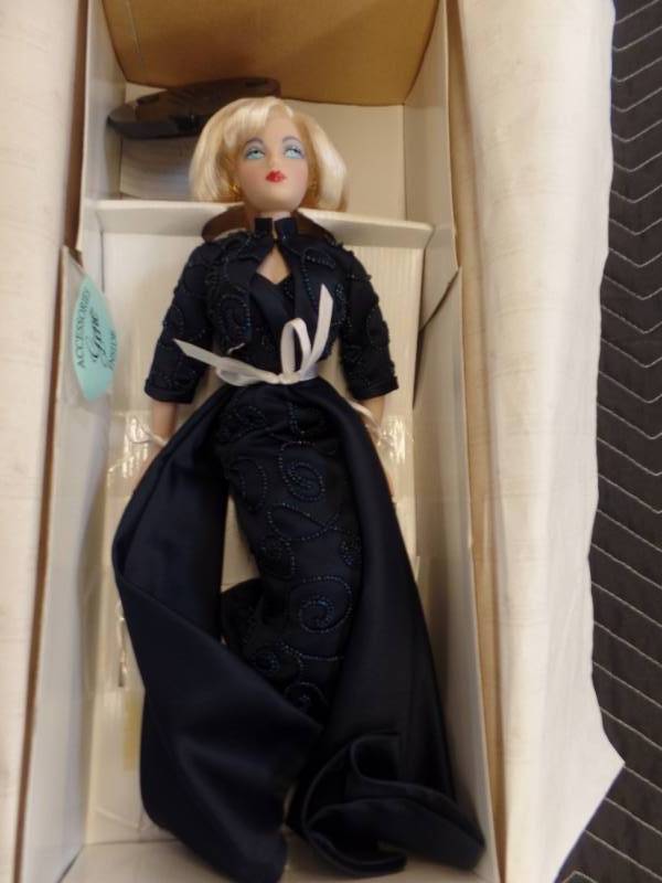 lot 315 image: MEL ODOMSGENE DOLL WITH COSTUME