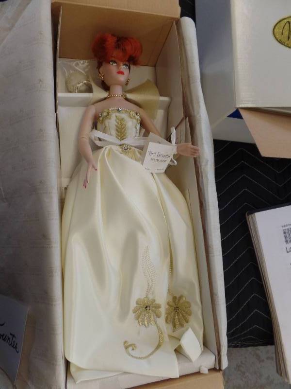 lot 332 image: MEL ODOMS MADRA DOLL WITH COSTUME