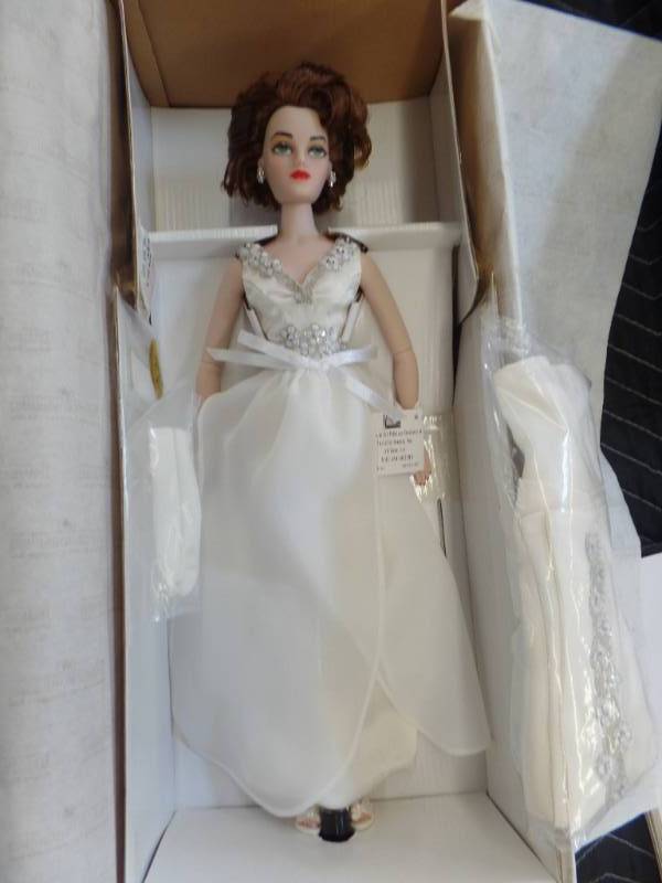 lot 333 image: MEL ODOMS MADRA DOLL WITH COSTUME