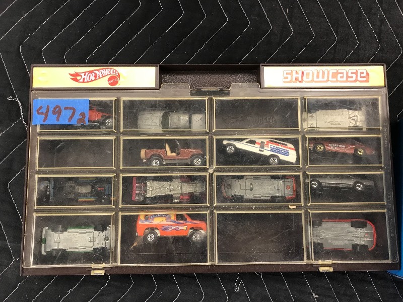 lot 497 image: HOT WHEELS CASES AND CARS
