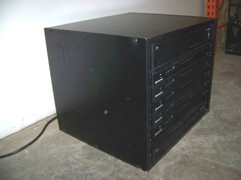 lot 88 image: Small  Compact, Wood Encased, Audio  Video Equipment  Component Rack with Crestron Components