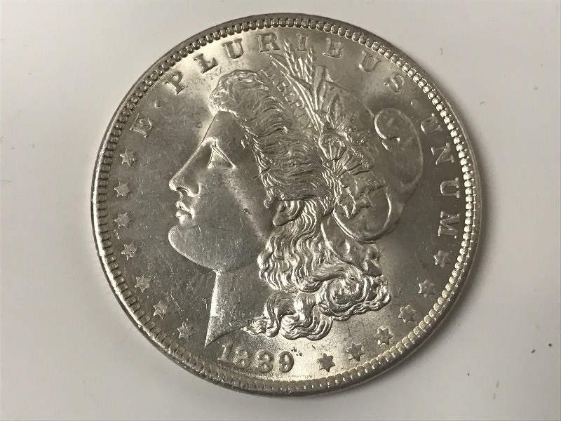 lot 10 image: 1889 Morgan Silver Dollar ...