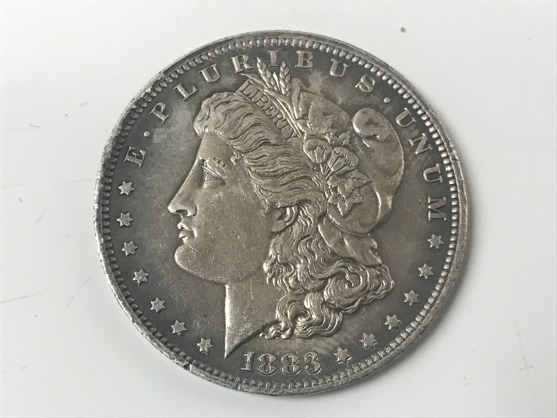 lot 20 image: 1883-O Morgan Silver Dollar ...
